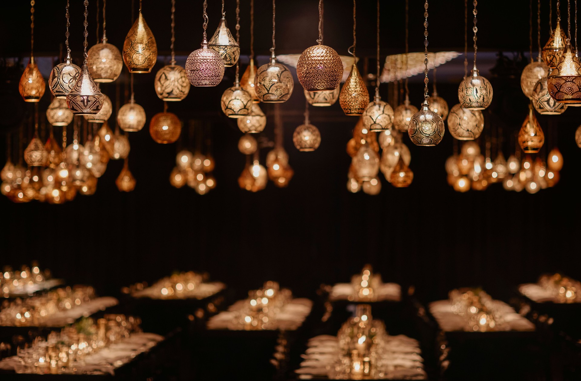 Exquisite Moroccan Lanterns Illuminate an Elegant Dining Setting. stock photo